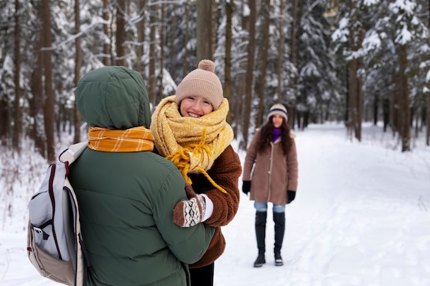 Medium shot happy family winter time