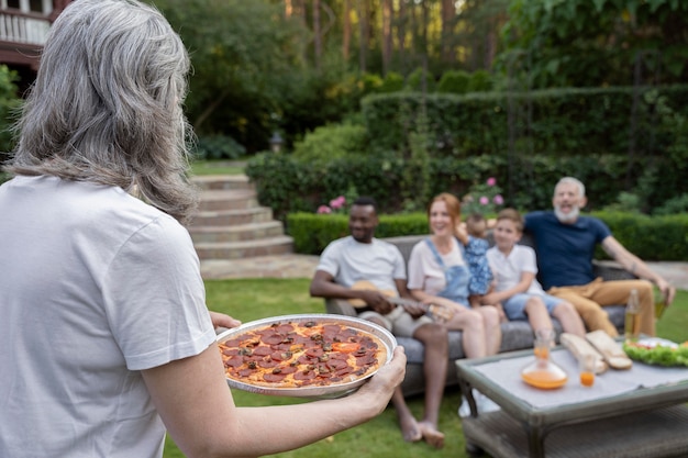 Medium shot happy family with food