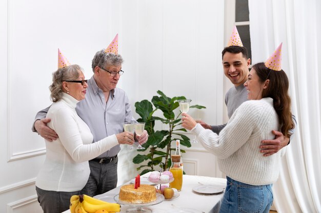 Medium shot happy family with hats