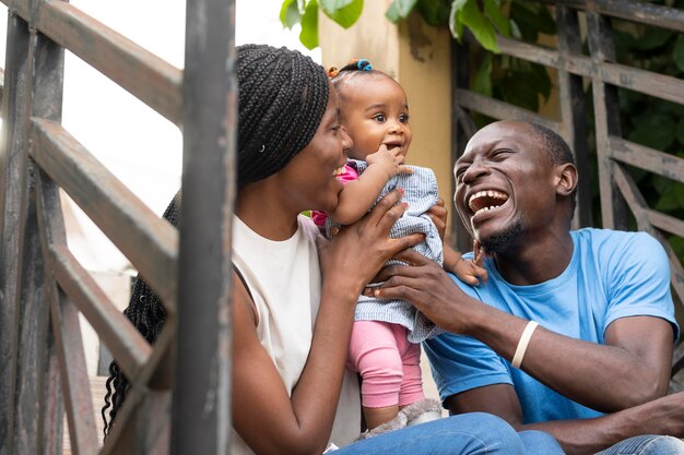 Medium shot happy family with kid