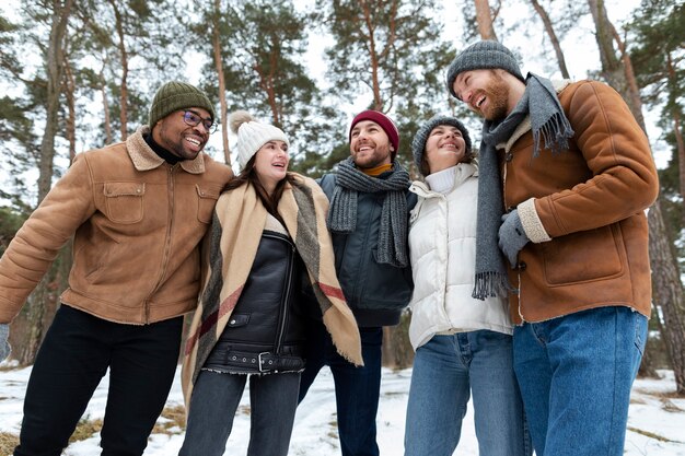 Medium shot happy friends reunion winter time