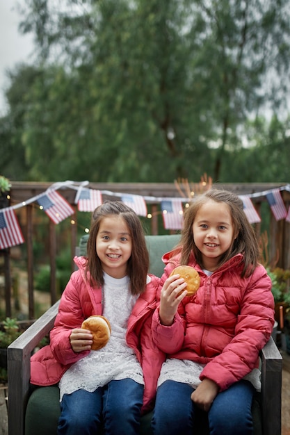 Free photo medium shot happy girls 4th of july celebration