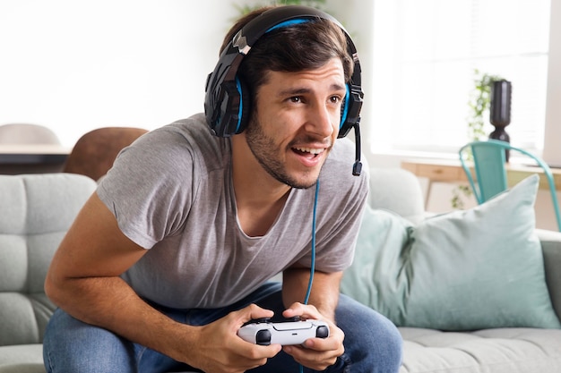 Medium shot happy  man playing game