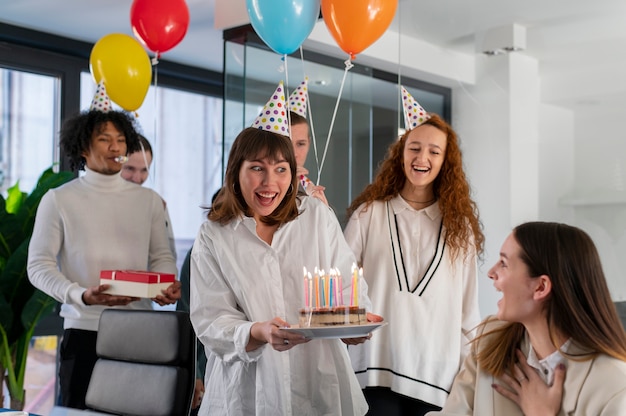 Medium shot happy people surprising woman