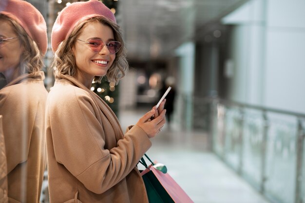 medium shot happy woman at local retail