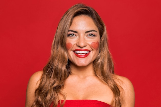 Medium shot happy woman wearing red lipstick