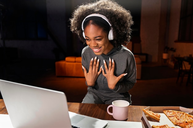 Medium shot happy woman with headphones