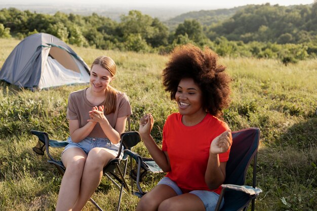 Medium shot happy women outdoors