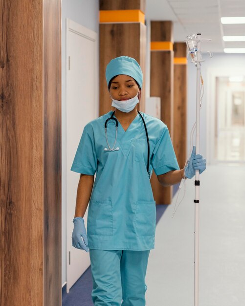 Medium shot health worker with mask