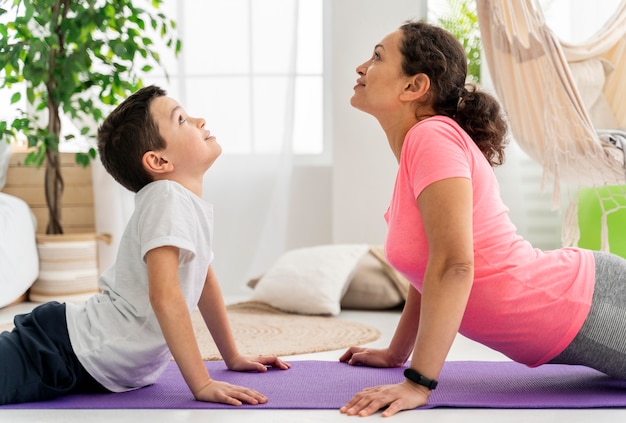 Medium shot kid and woman training