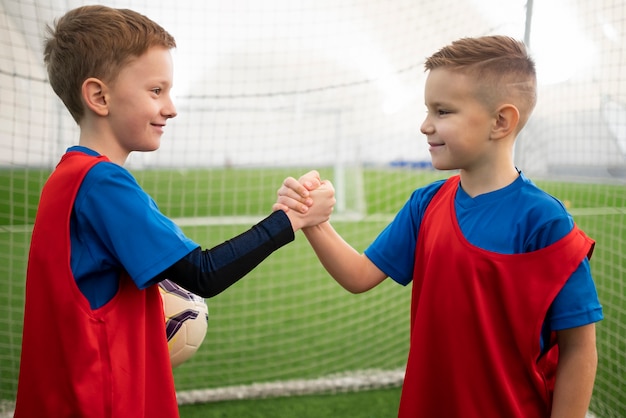 Medium shot kids holding hands