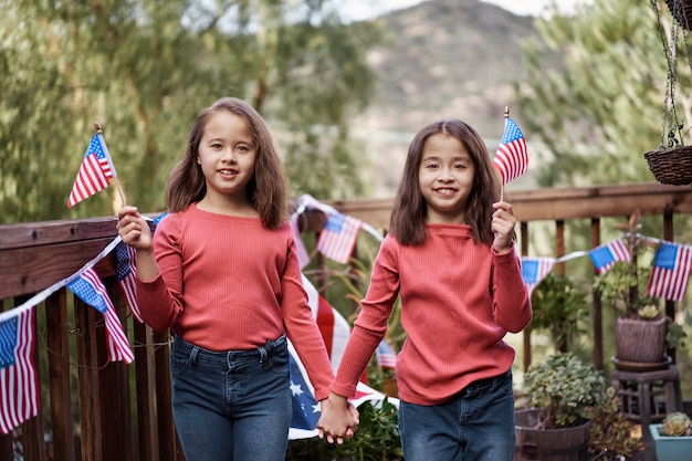 Free photo medium shot little girls celebrating 4th of july