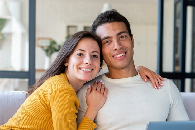 Medium shot of lovely smiling couple