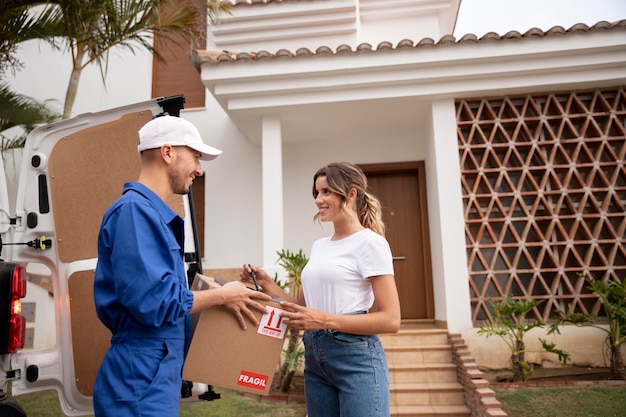 Medium shot man delivering box