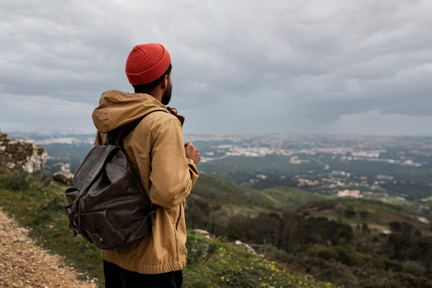 Medium shot man on hiking tour