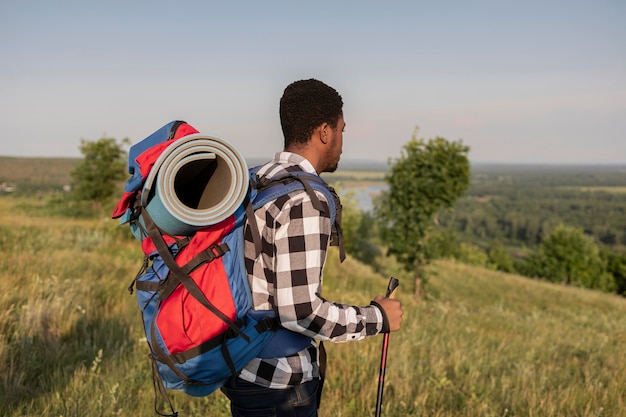 Medium shot man hiking