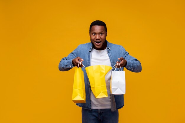 Medium shot man holding bags