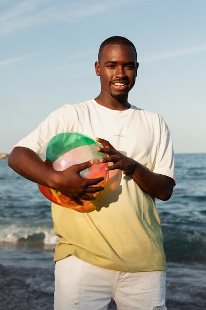 Medium shot man holding ball