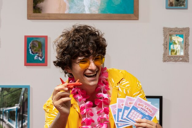 Medium shot man holding lottery tickets