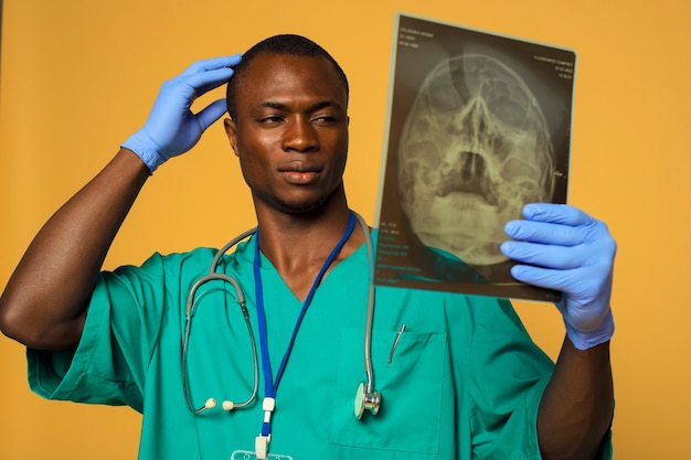 Medium shot man holding radiography