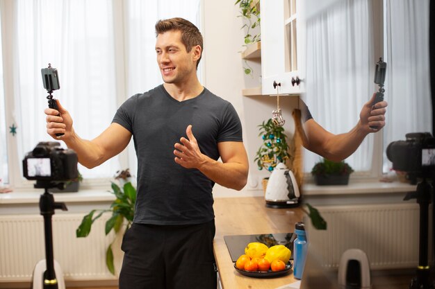 Medium shot man holding smartphone