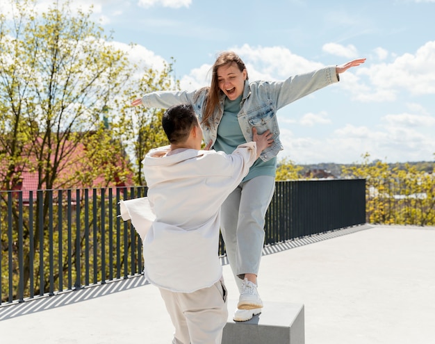 Medium shot man holding woman