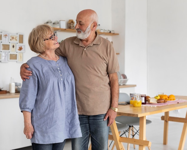 Medium shot man holding woman