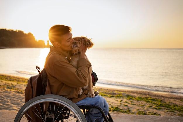 Medium shot man kissing cute dog