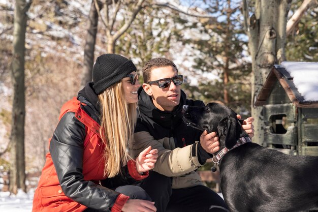 Medium shot man petting dog