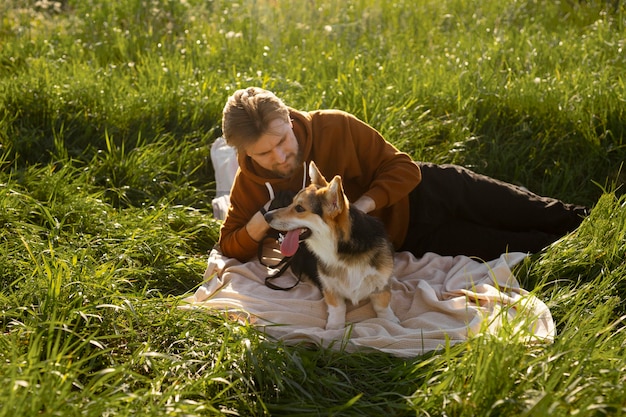 Medium shot man petting dog