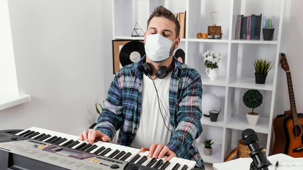 Free photo medium shot man playing an instrument