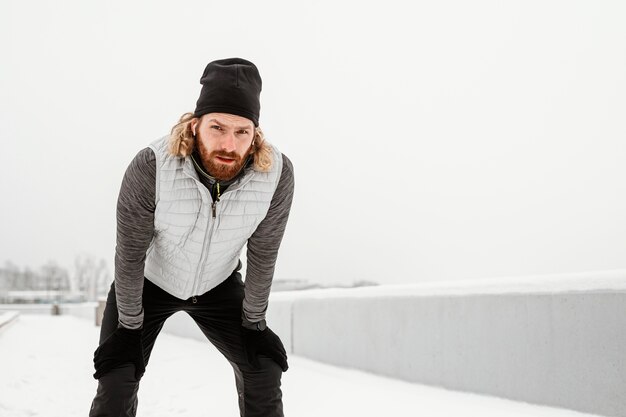 medium shot man posing outdoors