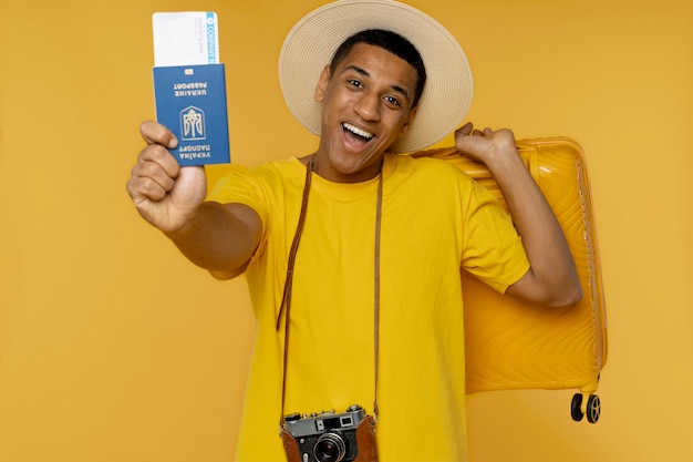 Medium shot man posing with baggage