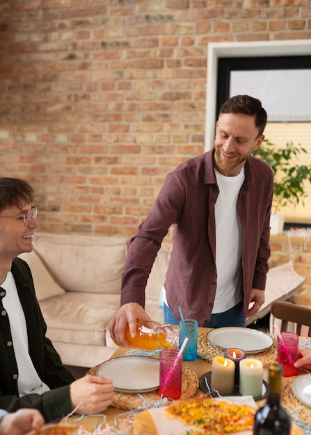 Medium shot man pouring drink