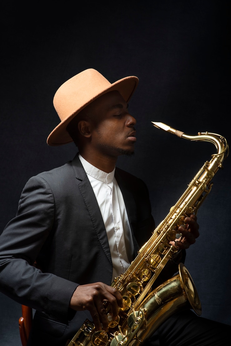 Free Photo medium shot man ready to play saxophone