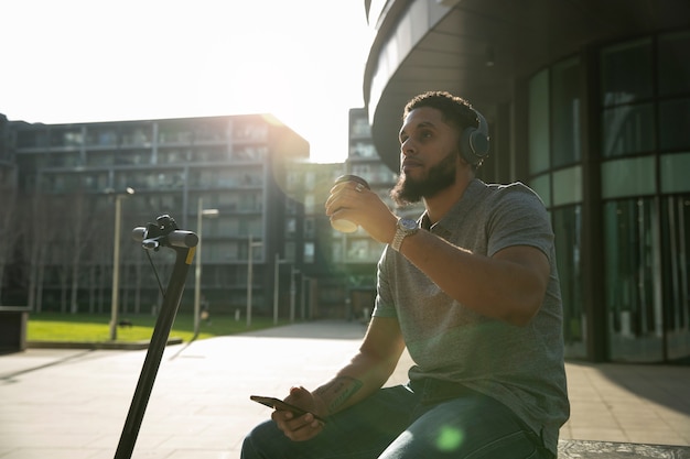 Medium shot man sitting on bench