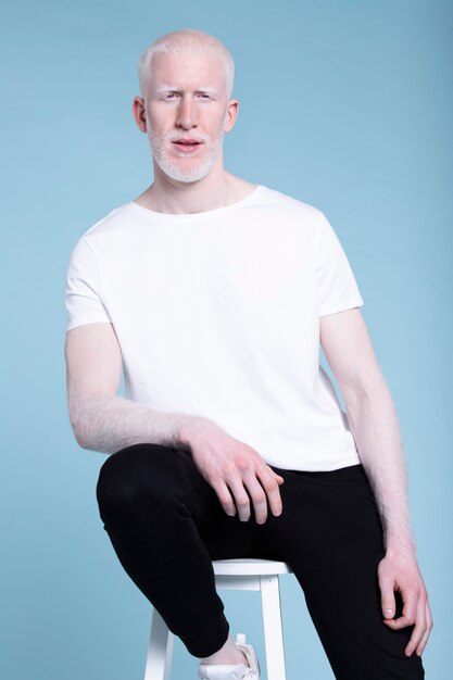 Medium shot man sitting on chair