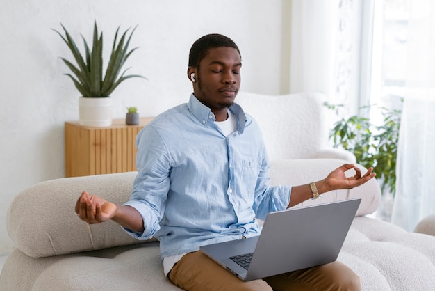 Free photo medium shot man stretching at home