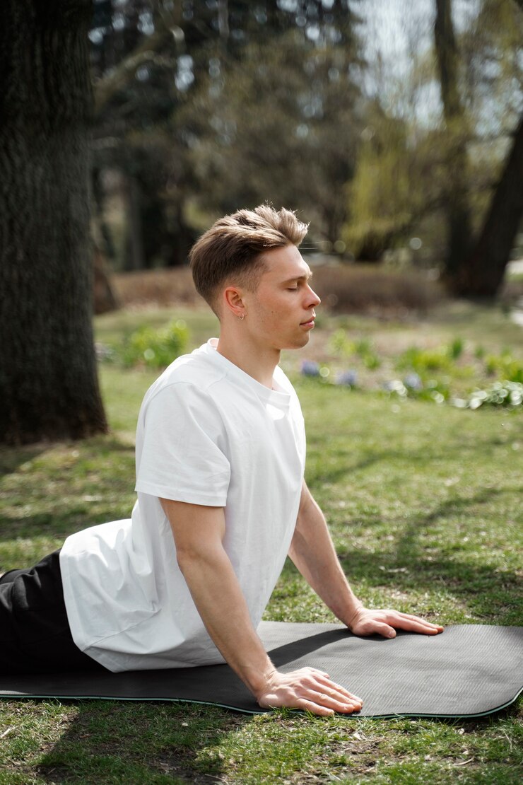 Free Photo medium shot man stretching on mat