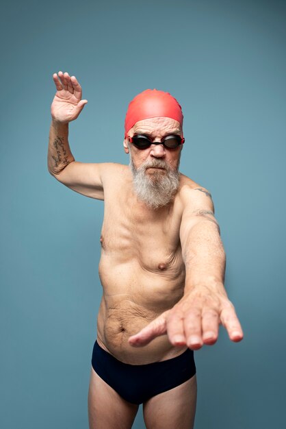 Medium shot man swimming