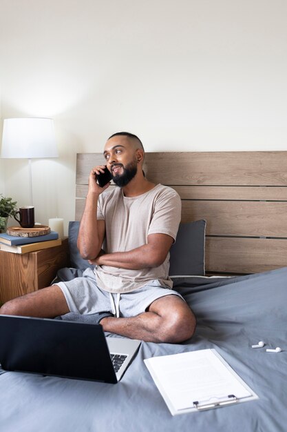 medium shot man talking on phone