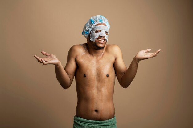 Medium shot man wearing shower cap