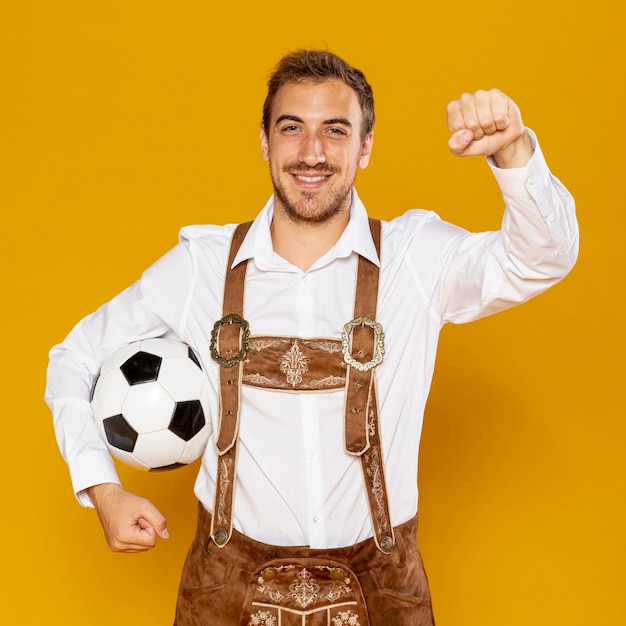 Free photo medium shot of man with ball