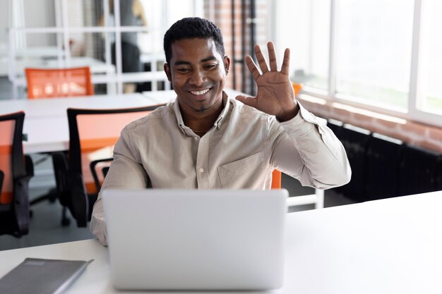 Medium shot man with laptop