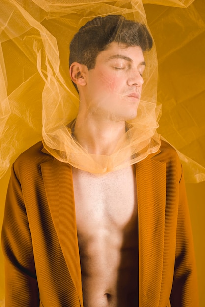 Medium shot man with yellow cloth