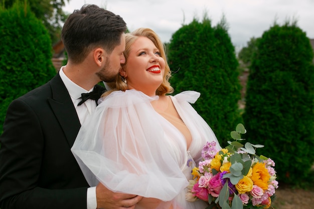 Free photo medium shot married couple posing