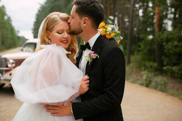 Medium shot married couple posing