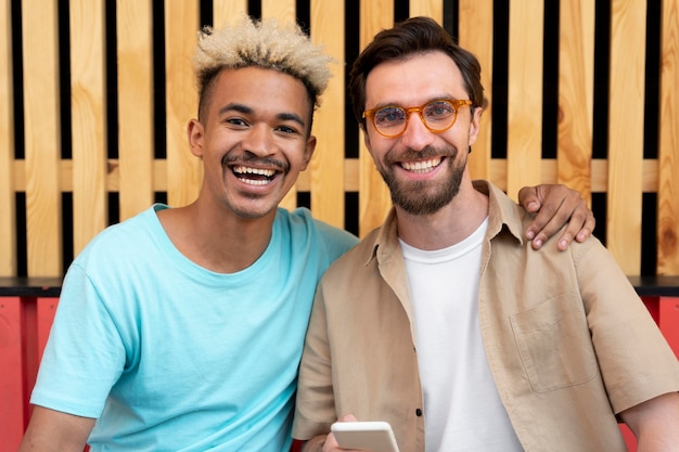 Medium shot men posing together