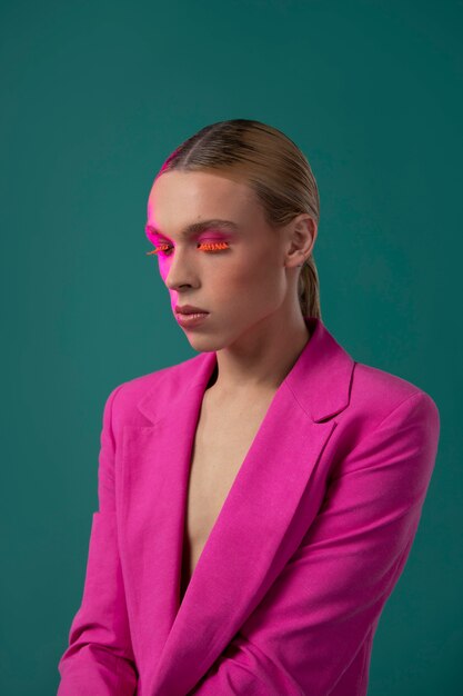 Medium shot model posing with pink jacket