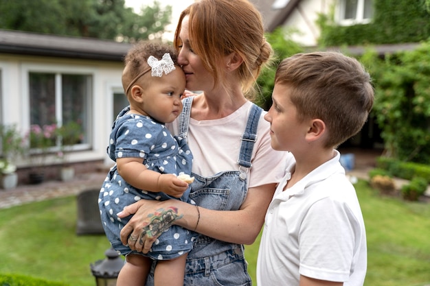 Medium shot mother and cute kids